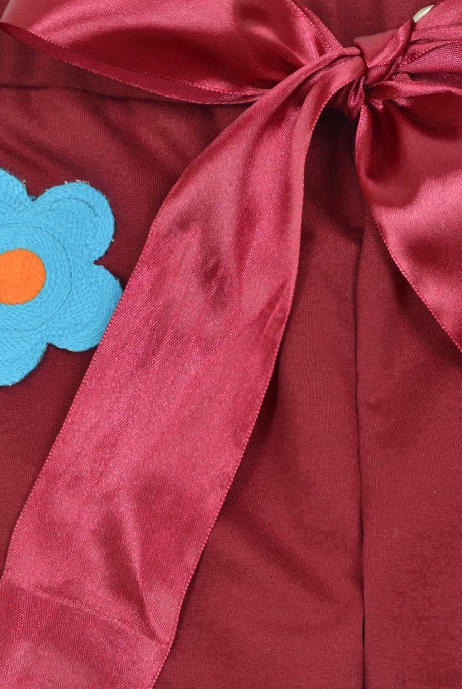 Яркие спортивные штаны с цветочными аппликациями- Фото 3