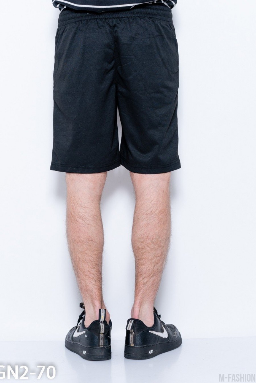 Черные трикотажные шорты с карманами на молниях- Фото 3