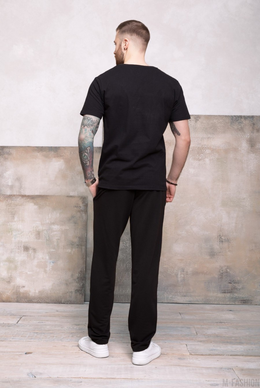 Черные трикотажные штаны прямого кроя- Фото 3