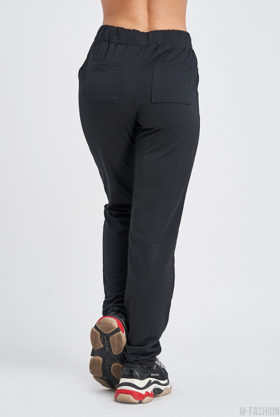 Черные штаны с карманами выполненные из трикотажа- Фото 5