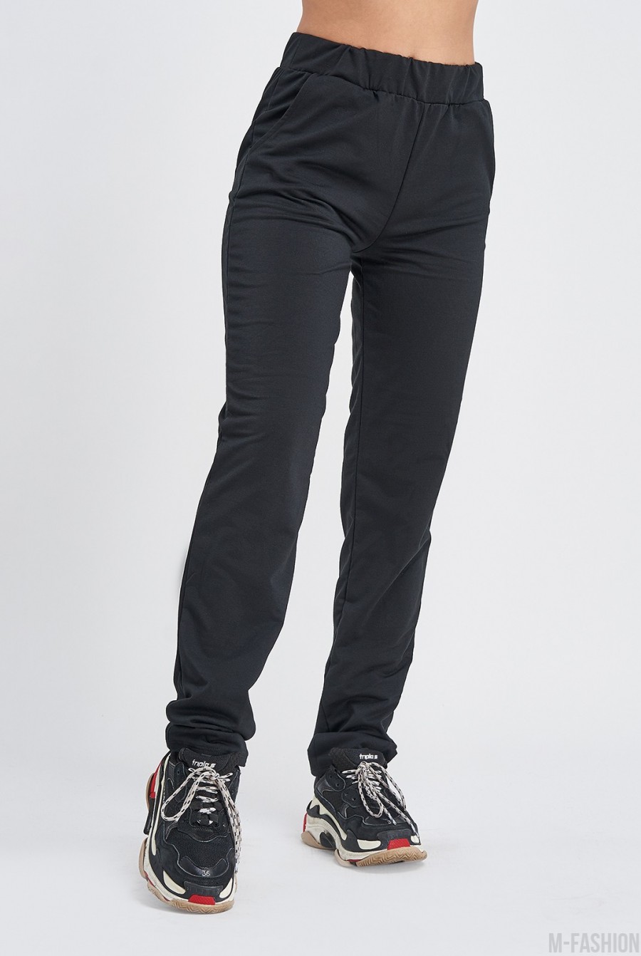Черные штаны с карманами выполненные из трикотажа - Фото 1