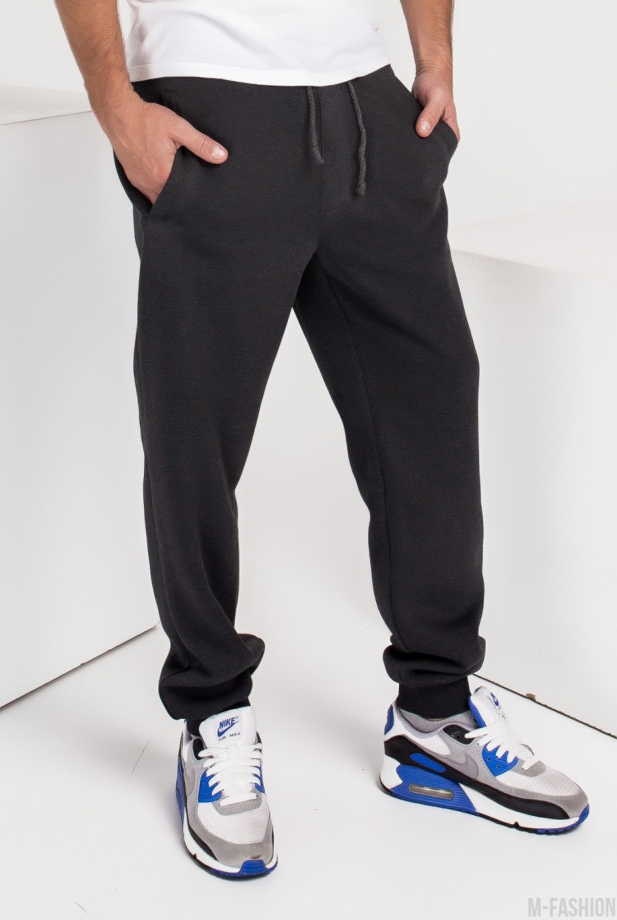 Темно-серые утепленные флисом спортивные штаны с манжетами - Фото 1