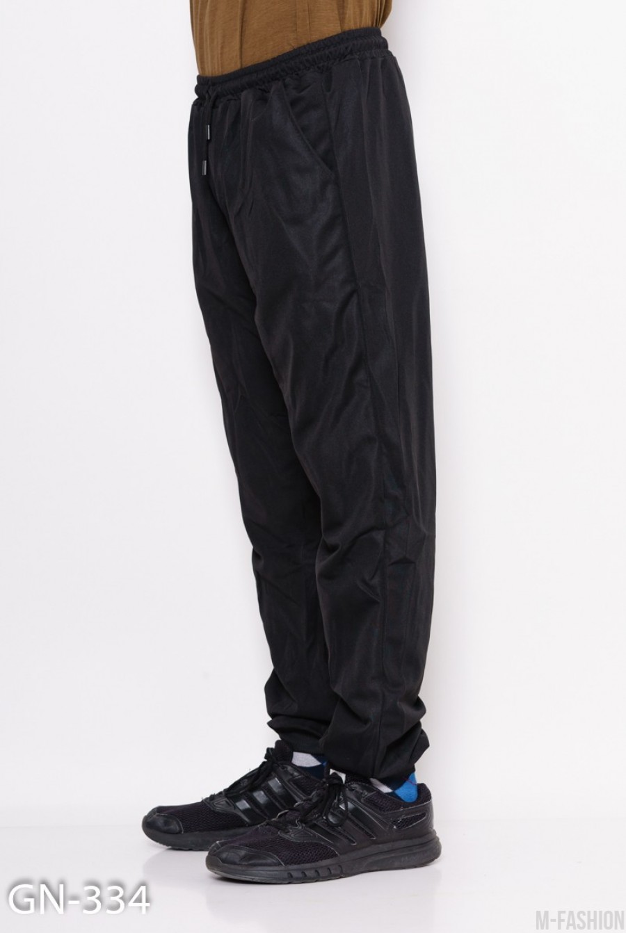 Черные свободные штаны на манжетах с декоративной вставкой на кармане с молнией- Фото 3