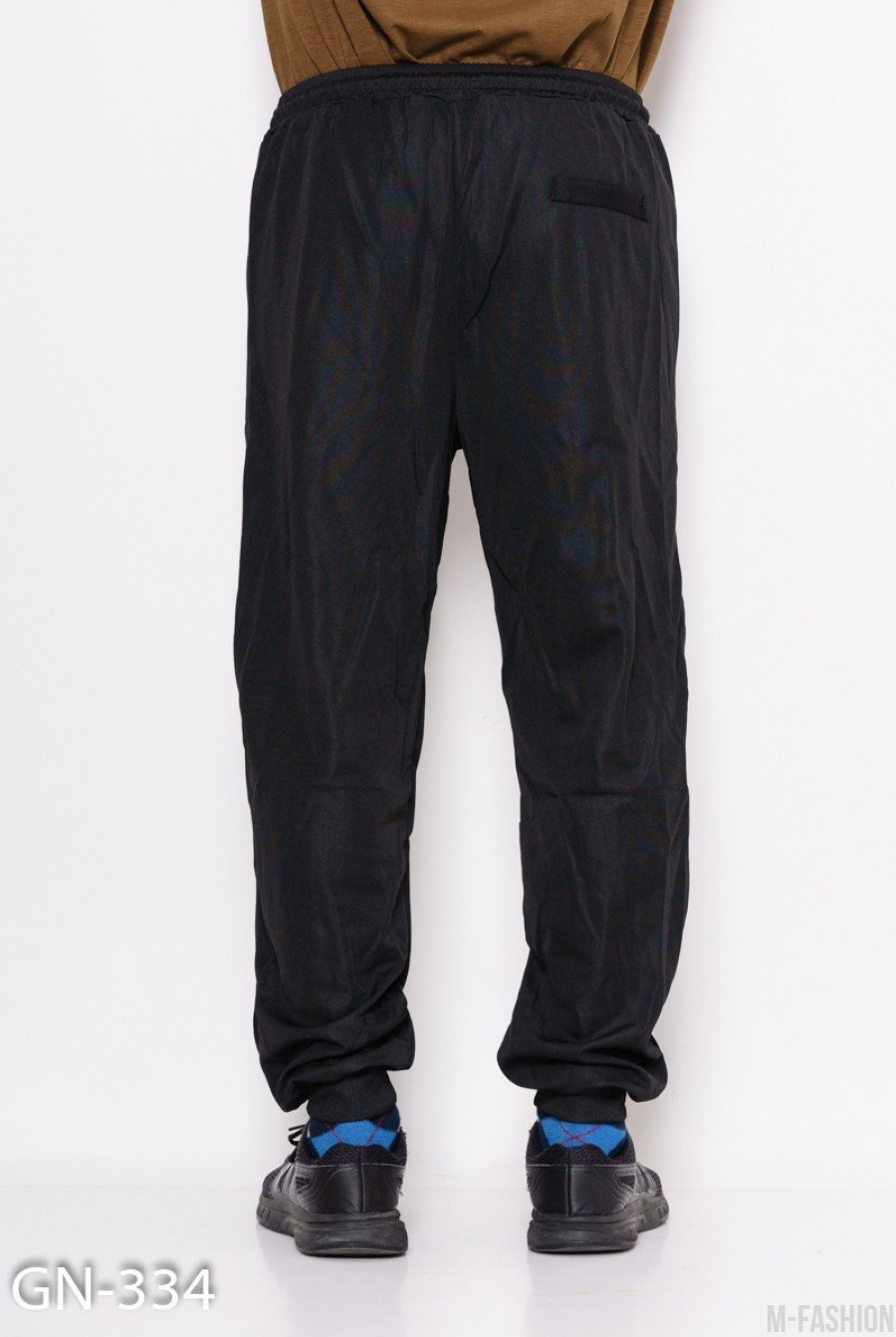 Черные свободные штаны на манжетах с декоративной вставкой на кармане с молнией- Фото 4
