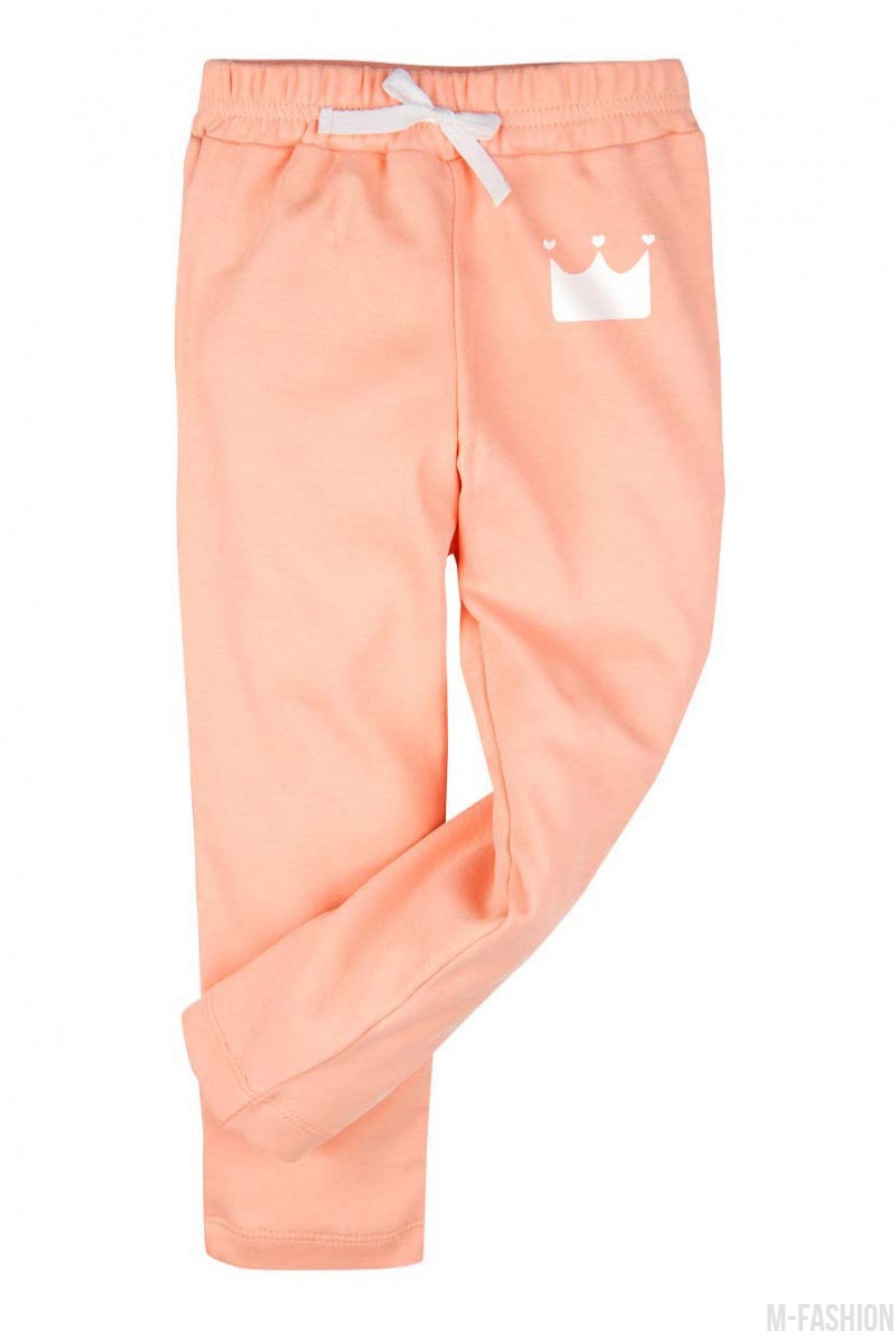 Персиковые трикотажные штаны с принтом - Фото 1