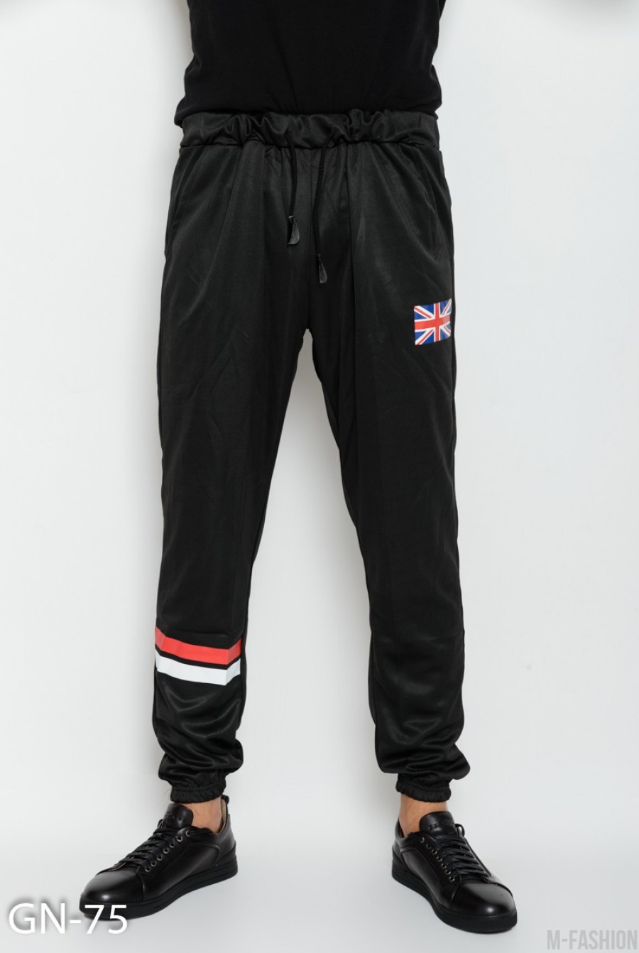 Черные тонкие спортивные штаны с тремя карманами и принтом - Фото 1