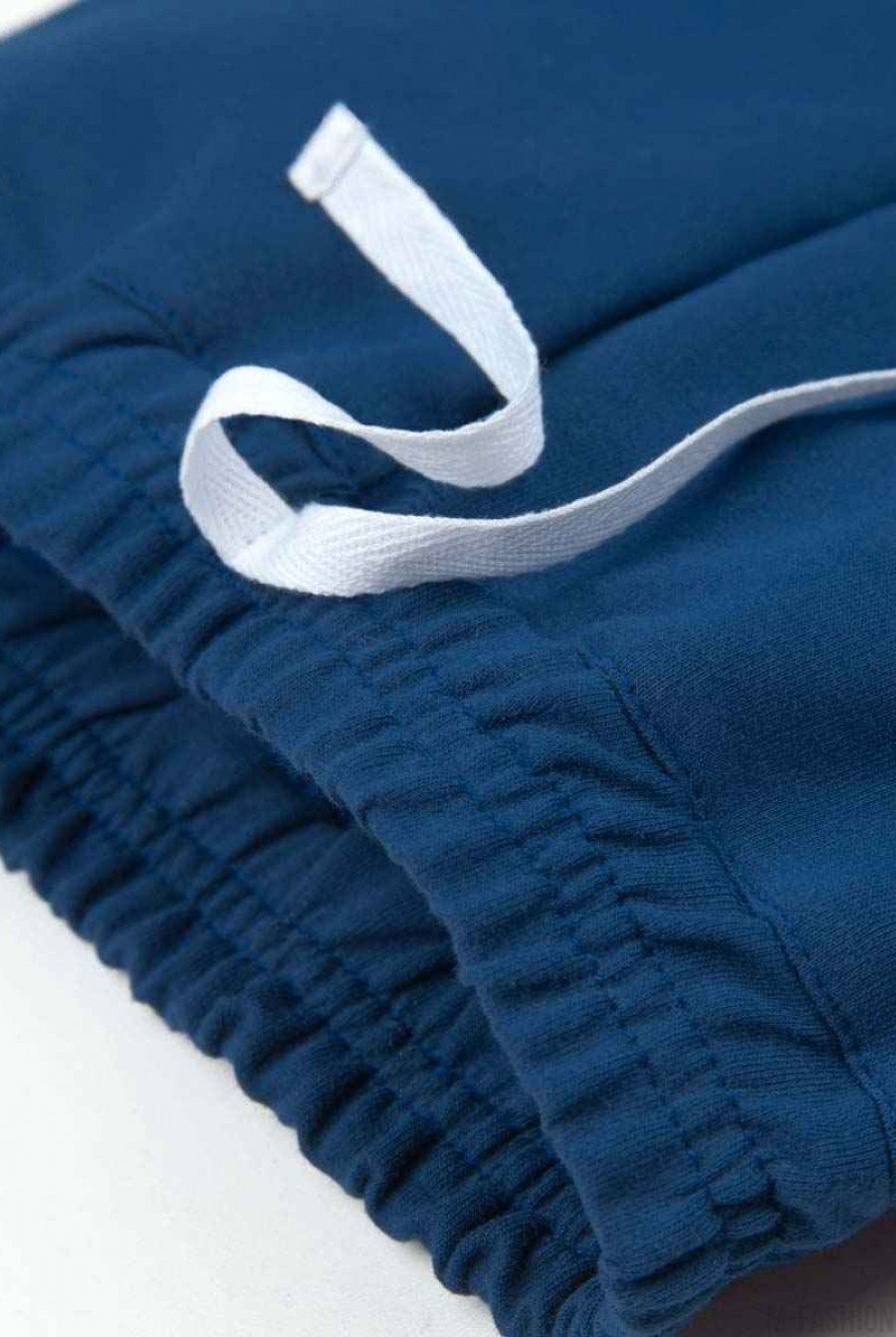 Синие штаны на резинке из футера с принтом- Фото 5