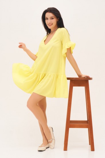 Желтое платье-трапеция с воланами