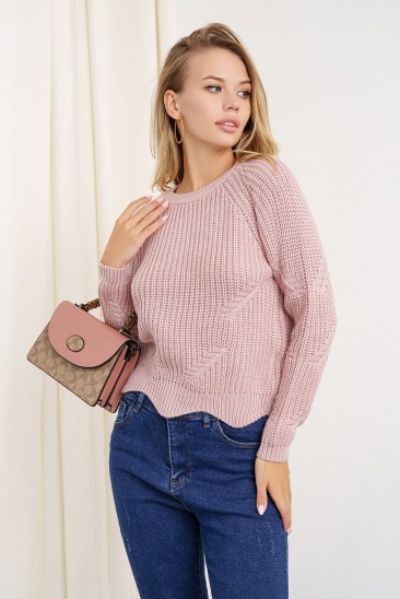 Розовый вязаный свитер с фигурным низом