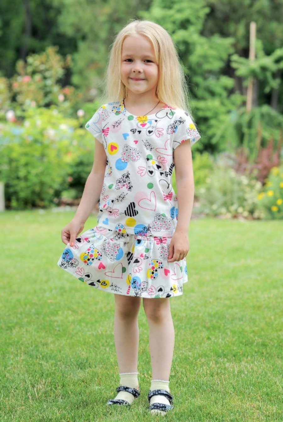 Летняя хлопковая юбка белого цвета с ярким цветным принтом- Фото 2