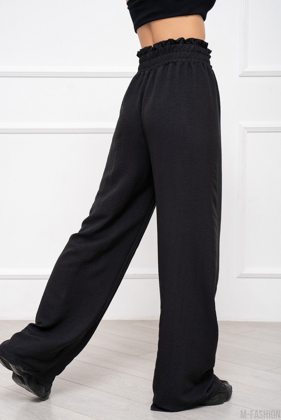 Свободные черные брюки с широкой резинкой - Фото 3