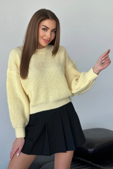 Желтый вязаный свитер из шерсти