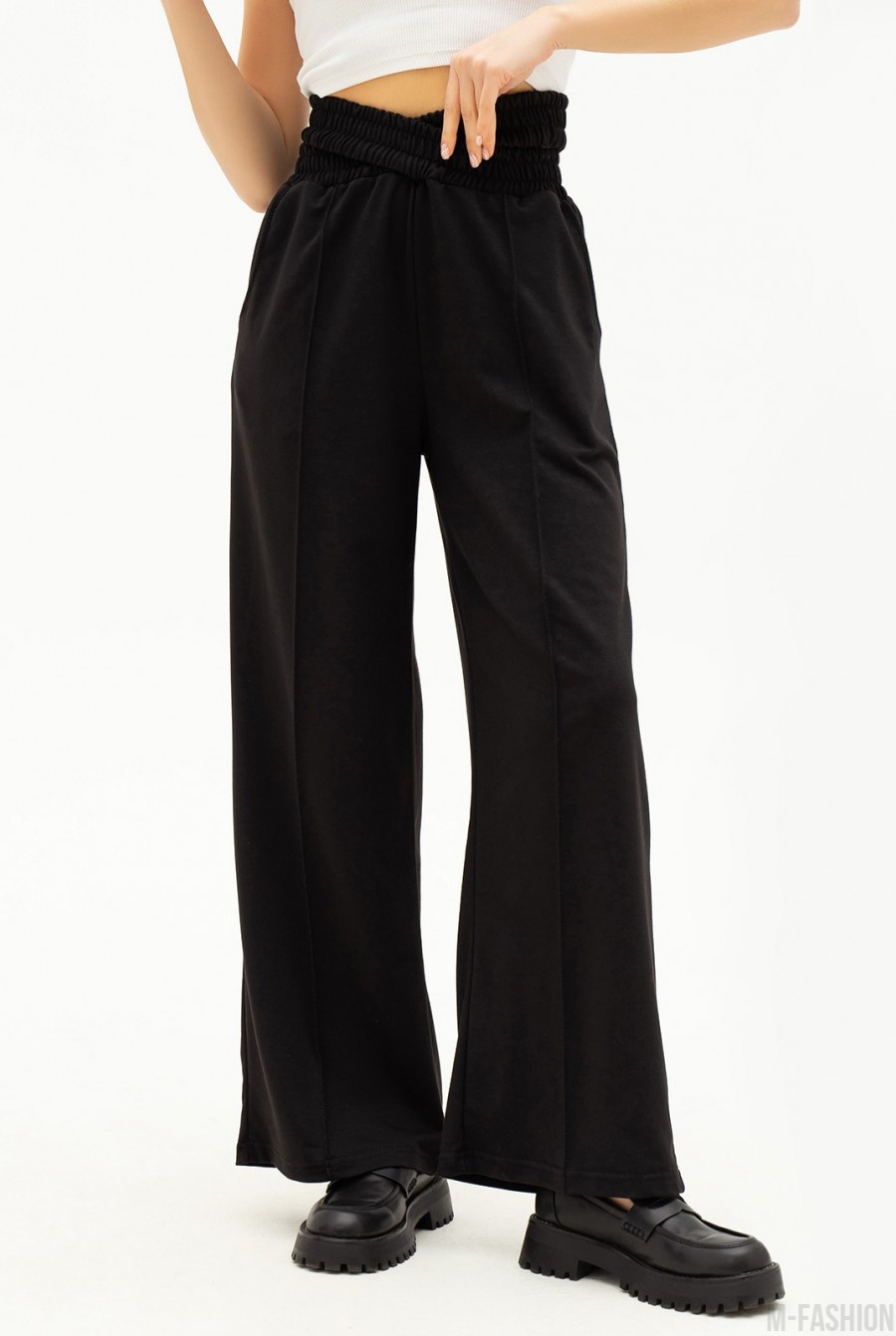 Черные свободные брюки с двойной резинкой  - Фото 1